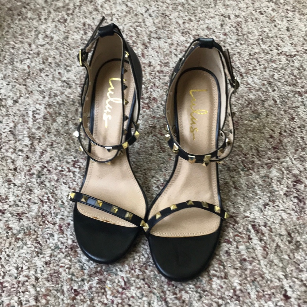 Black strapped heels